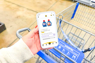 hand holding a smartphone displaying a 1-clip coupon of Persil in the KCL app