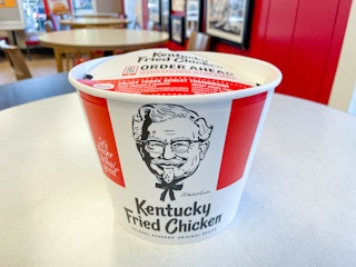 backet of kfc chicken in bucket on table
