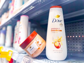 Dove body scrub and body wash on a Walmart shelf
