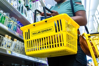 a woman shopping in Dollar General looking for penny list items
