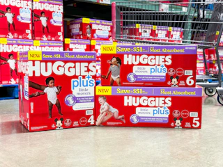 huggies diapers in front of cart in store floor