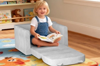 a girl on a sofa bed