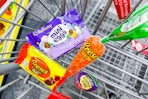 reeses and cadbury candy in a cart