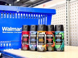 five axe body spray in front of walmart hand cart on shelf