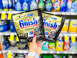 hand holding finish dishwasher tabs in cvs