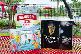 Smirnoff, Guinness, and Captain Morgan products in a pool area
