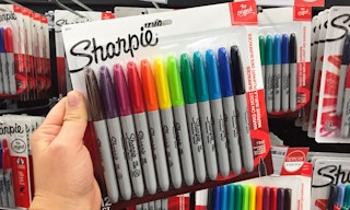 hand holding colored sharpie multipack at staples